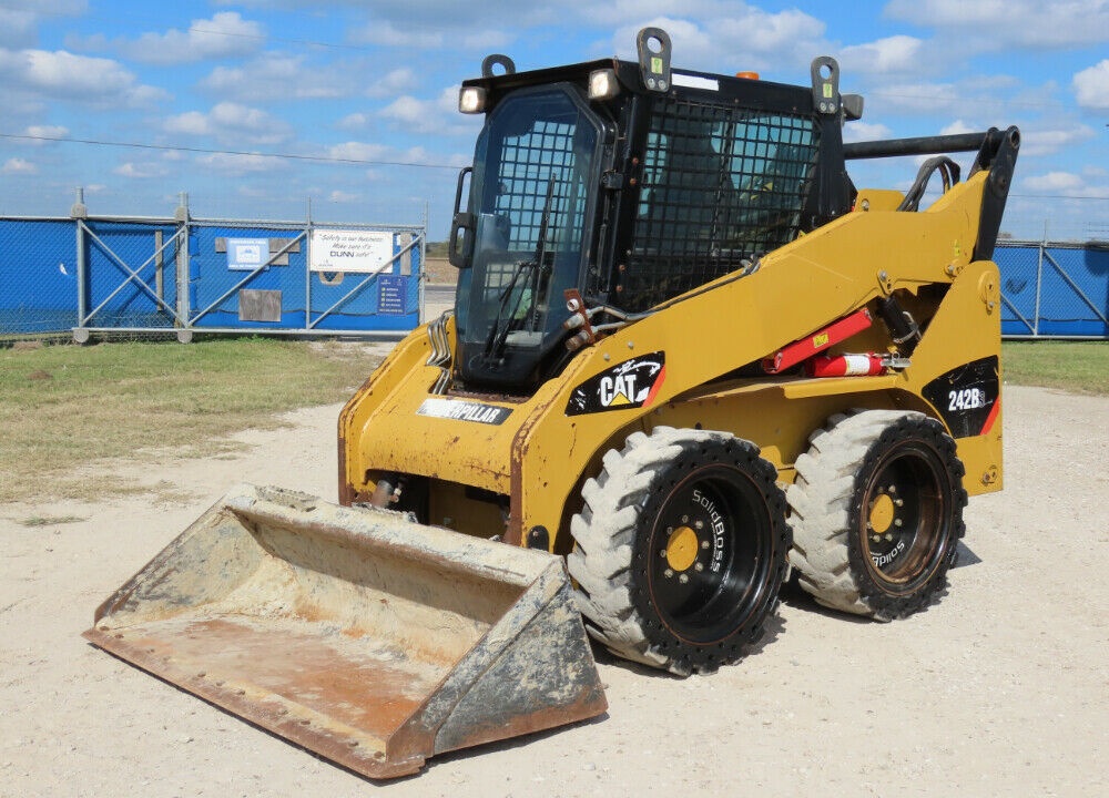 2012 Caterpillar 242B3 Skid Steer Wheel Loader A/C Cab Diesel Aux Hyd Hand and Foot Throttle